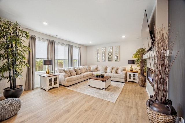 18437 111th Ave E, Puyallup, WA 98374 - living area featuring light wood-type flooring and recessed lighting