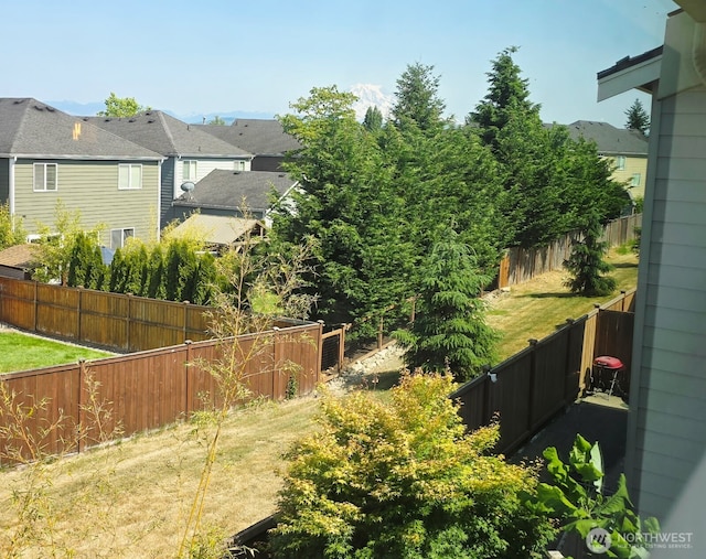 18437 111th Ave E, Puyallup, WA 98374 - fenced backyard featuring a residential view