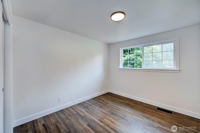 19807 80th Pl W, Edmonds, WA 98026 - unfurnished room featuring baseboards and dark wood-style flooring