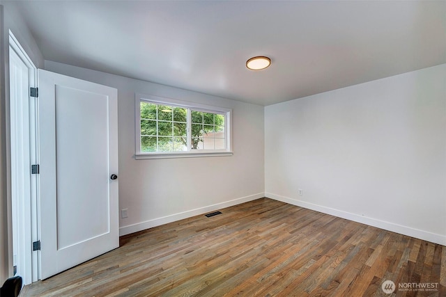 19807 80th Pl W, Edmonds, WA 98026 - spare room with wood finished floors and baseboards