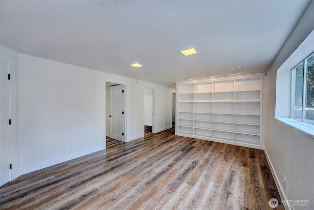 19807 80th Pl W, Edmonds, WA 98026 - unfurnished room with wood finished floors and a textured ceiling