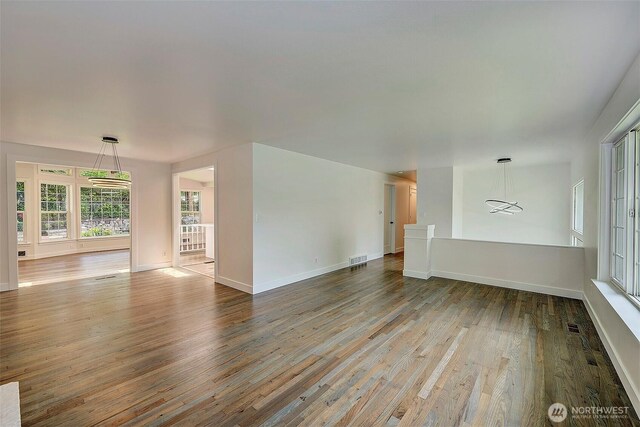 19807 80th Pl W, Edmonds, WA 98026 - unfurnished living room with wood finished floors and baseboards