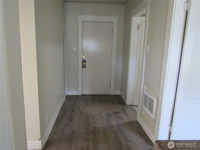 301 W 3rd St, Aberdeen, WA 98520 - hallway featuring wood finished floors and baseboards