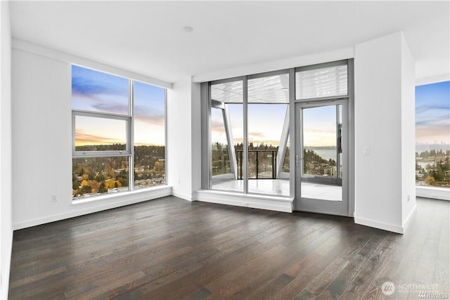 188 Bellevue Way NE Unit 1907, Bellevue, WA 98004 - unfurnished room featuring wood finished floors and baseboards