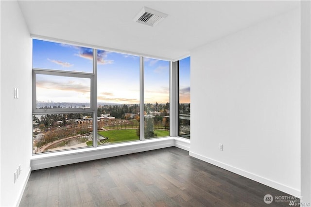 188 Bellevue Way NE Unit 1907, Bellevue, WA 98004 - unfurnished room featuring dark wood finished floors