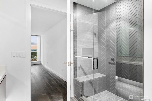 188 Bellevue Way NE Unit 1907, Bellevue, WA 98004 - full bath with a shower stall, wood finished floors, and vanity