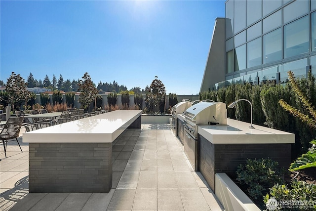 188 Bellevue Way NE Unit 1907, Bellevue, WA 98004 - view of patio / terrace featuring an outdoor kitchen