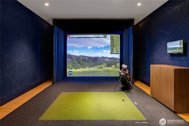 188 Bellevue Way NE Unit 1907, Bellevue, WA 98004 - rec room with golf simulator, carpet, recessed lighting, and tile walls