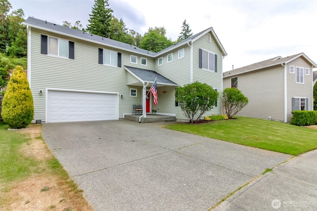 1194 Swan Loop, Dupont, WA 98327 - traditional-style house with an attached garage, concrete driveway, and a front yard