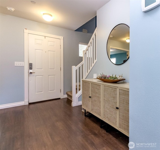 1194 Swan Loop, Dupont, WA 98327 - foyer with dark wood finished floors and stairway
