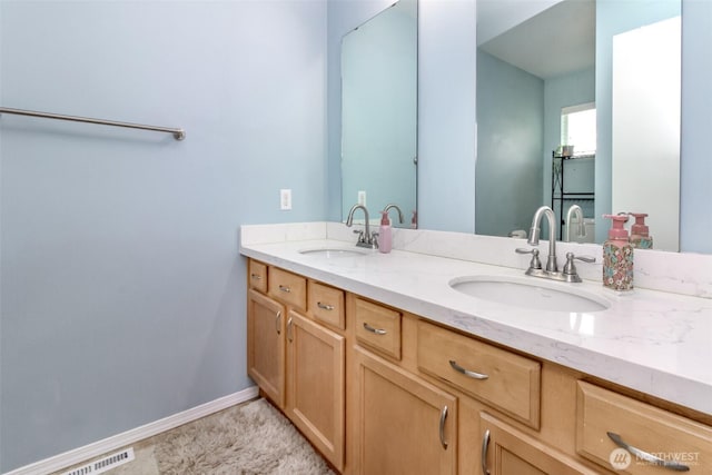 1194 Swan Loop, Dupont, WA 98327 - full bathroom featuring double vanity and baseboards