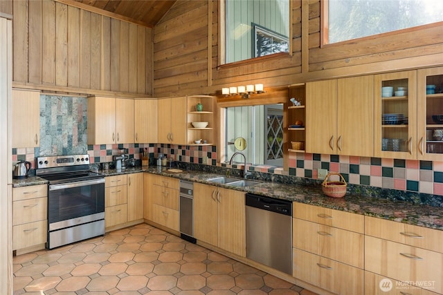 1585 Channel Rd, Lopez Island, WA 98261 - kitchen with open shelves, stainless steel appliances, light brown cabinetry, high vaulted ceiling, and backsplash