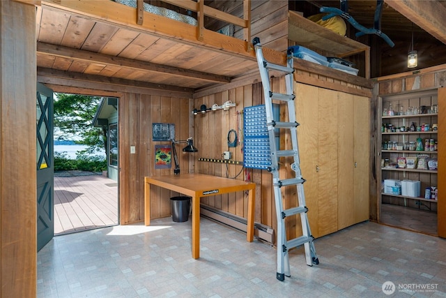 1585 Channel Rd, Lopez Island, WA 98261 - misc room with a wooden ceiling with exposed beams, a baseboard radiator, and wooden walls