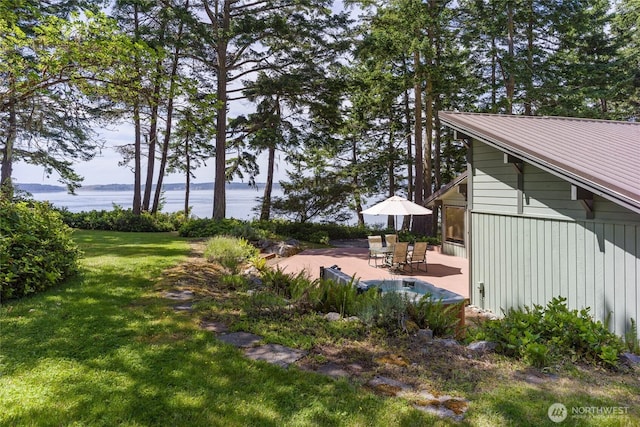1585 Channel Rd, Lopez Island, WA 98261 - view of grassy yard featuring a patio and a water view