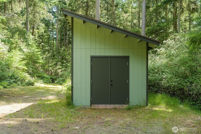 1585 Channel Rd, Lopez Island, WA 98261 - view of shed featuring a view of trees