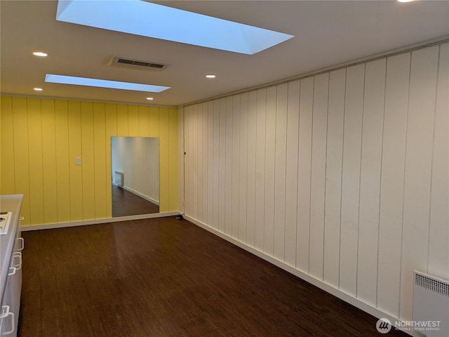 1585 Channel Rd, Lopez Island, WA 98261 - empty room with a skylight and dark wood finished floors
