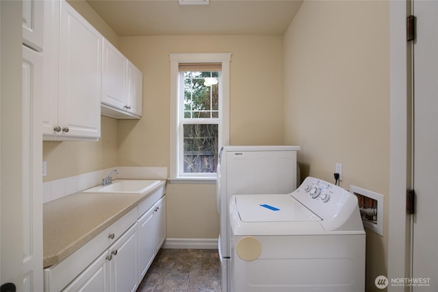 2605 Fir Crest Blvd, Anacortes, WA 98221 - laundry room with cabinet space, washing machine and dryer, and stone finish floors