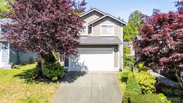 16955 Lookout Mountain Rd SE, Monroe, WA 98272 - traditional-style home featuring driveway, a garage, and a front yard