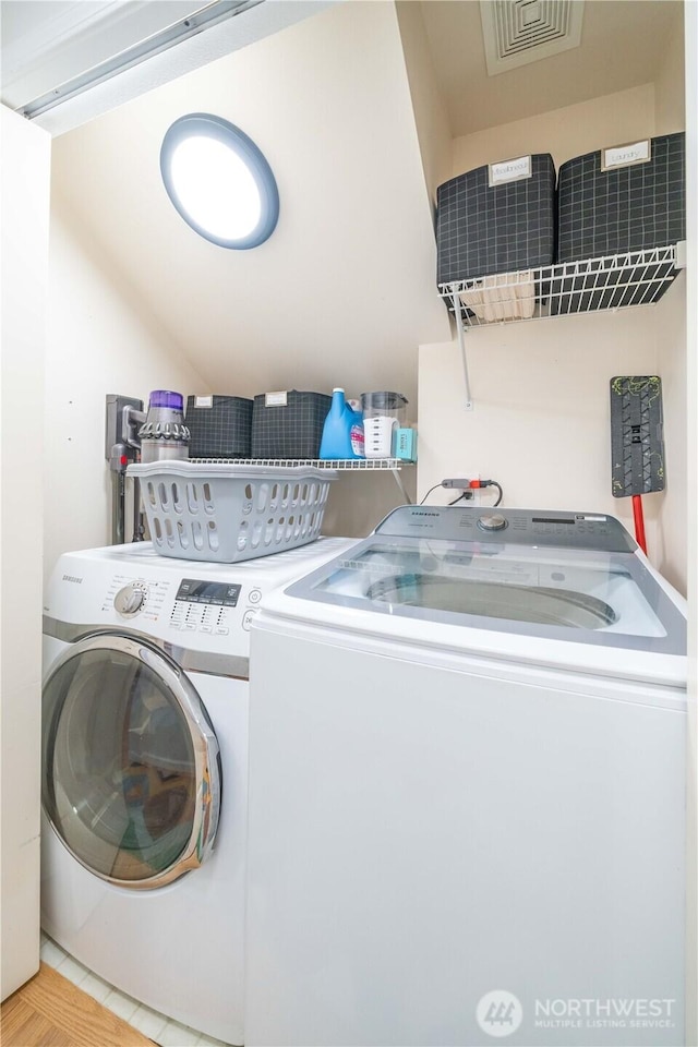 16955 Lookout Mountain Rd SE, Monroe, WA 98272 - washroom with washing machine and dryer and tile patterned flooring