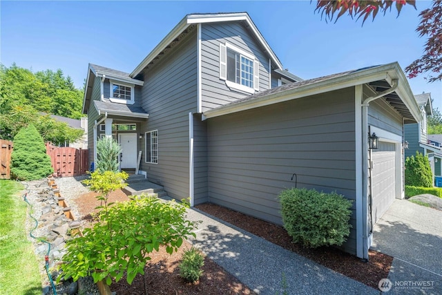 16955 Lookout Mountain Rd SE, Monroe, WA 98272 - view of home's exterior with concrete driveway and an attached garage