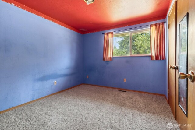 7331 Ridgemont Dr SE, Olympia, WA 98513 - spare room with carpet