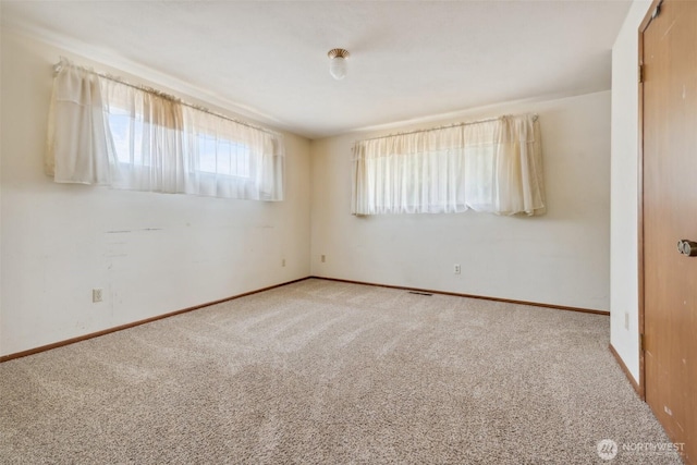 7331 Ridgemont Dr SE, Olympia, WA 98513 - unfurnished room featuring carpet floors and baseboards