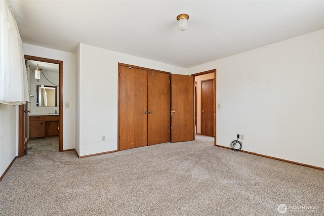 7331 Ridgemont Dr SE, Olympia, WA 98513 - unfurnished bedroom featuring a closet and light colored carpet