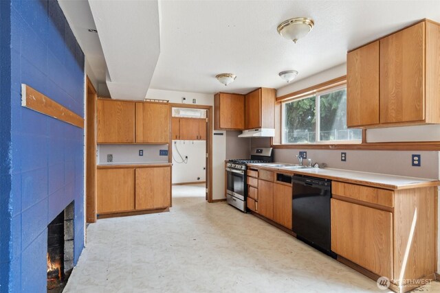 7331 Ridgemont Dr SE, Olympia, WA 98513 - kitchen with stainless steel range with gas cooktop, black dishwasher, under cabinet range hood, light flooring, and a large fireplace