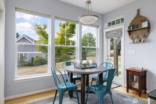 1404 Portside Ct, Freeland, WA 98249 - dining space featuring light wood-style flooring and baseboards