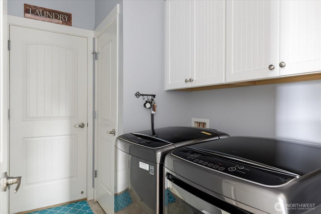 1404 Portside Ct, Freeland, WA 98249 - laundry room with separate washer and dryer and cabinet space
