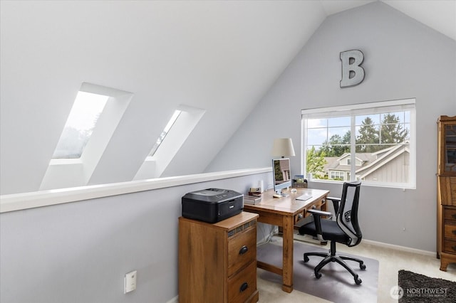 1404 Portside Ct, Freeland, WA 98249 - home office featuring vaulted ceiling, light carpet, and a skylight