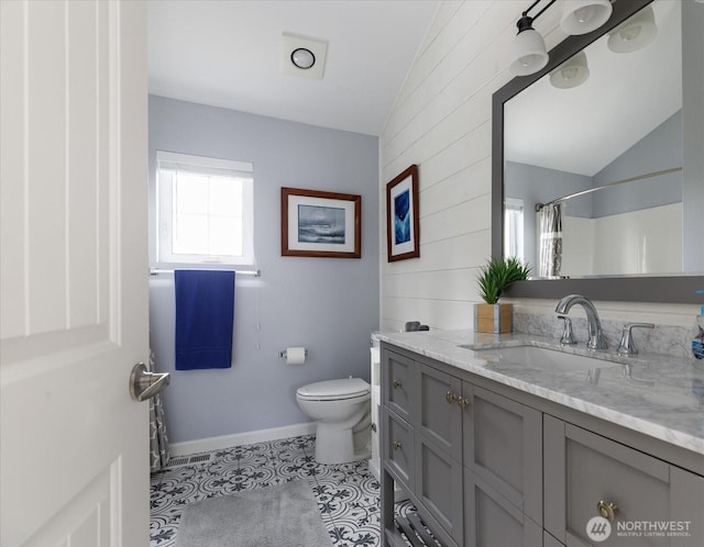 1404 Portside Ct, Freeland, WA 98249 - full bathroom with vaulted ceiling, vanity, tile patterned floors, a shower with curtain, and wood walls