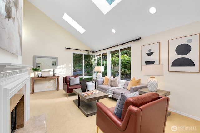11404 NE 103rd St, Kirkland, WA 98033 - living area with a skylight, a fireplace, high vaulted ceiling, light colored carpet, and recessed lighting