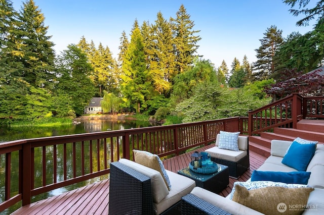 11404 NE 103rd St, Kirkland, WA 98033 - deck featuring an outdoor living space, a water view, and view of scattered trees