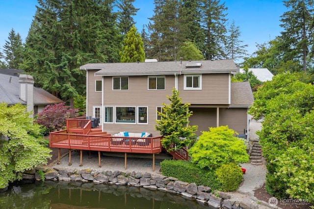 11404 NE 103rd St, Kirkland, WA 98033 - rear view of house with a wooden deck and a shingled roof