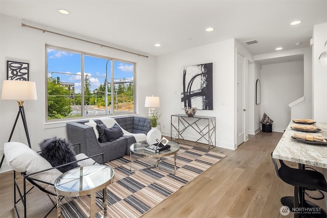11530 117th Ln NE Unit 2, Kirkland, WA 98034 - living area featuring hardwood / wood-style flooring and recessed lighting
