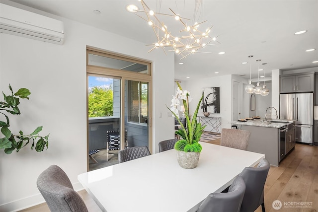 11530 117th Ln NE Unit 2, Kirkland, WA 98034 - dining space with an AC wall unit, light wood-type flooring, recessed lighting, and a chandelier
