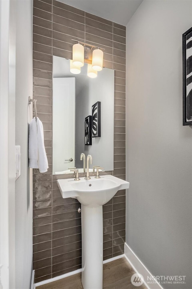 11530 117th Ln NE Unit 2, Kirkland, WA 98034 - bathroom featuring tile walls and a sink