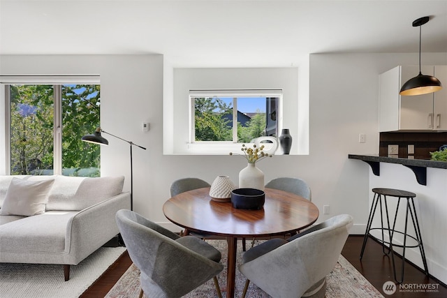 228 24th Ave E Unit A, Seattle, WA 98112 - dining area with healthy amount of natural light and dark wood-style flooring