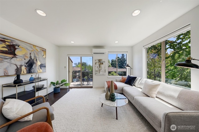 228 24th Ave E Unit A, Seattle, WA 98112 - living area featuring a wall mounted air conditioner, recessed lighting, and dark wood-style floors