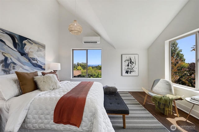 228 24th Ave E Unit A, Seattle, WA 98112 - bedroom with a wall mounted air conditioner, wood finished floors, and high vaulted ceiling