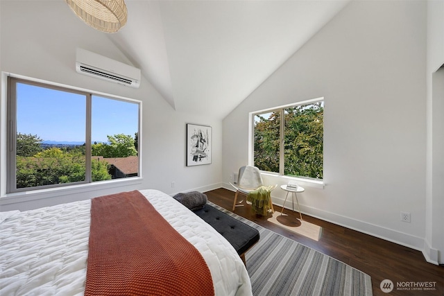 228 24th Ave E Unit A, Seattle, WA 98112 - bedroom featuring a wall unit AC, multiple windows, wood finished floors, and high vaulted ceiling