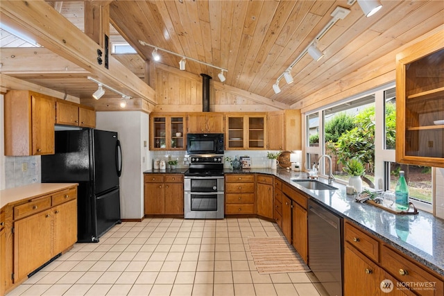 181 E Dabob Rd, Shelton, WA 98584 - kitchen with track lighting, black appliances, lofted ceiling, wood ceiling, and decorative backsplash