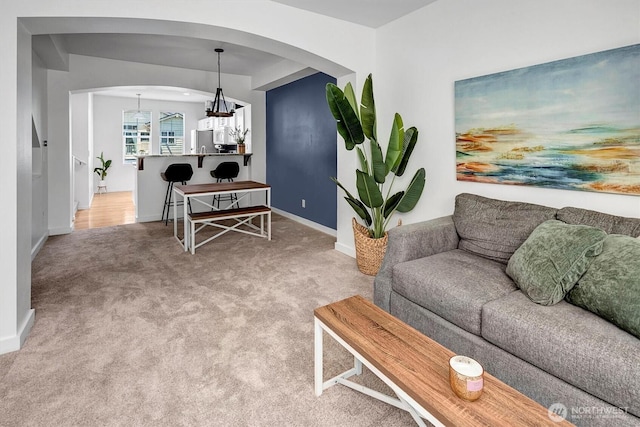 15325 SE 155th Pl Unit Q2, Renton, WA 98058 - living room featuring arched walkways and light colored carpet