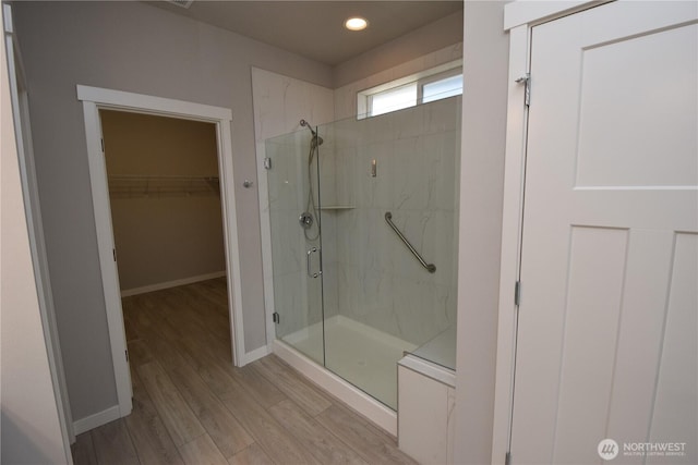 4650 Viridian Ave SW, Port Orchard, WA 98367 - bathroom featuring a shower stall, wood finished floors, a spacious closet, and recessed lighting