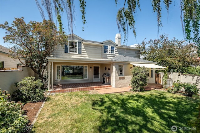 601 Yakima St, Wenatchee, WA 98801 - view of front facade featuring brick siding and a chimney