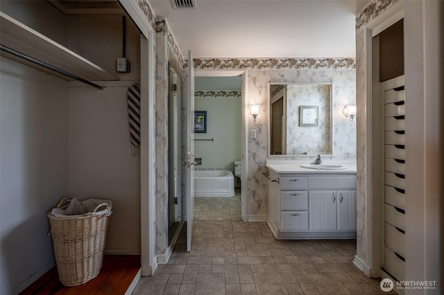 601 Yakima St, Wenatchee, WA 98801 - full bathroom with vanity and stone finish flooring