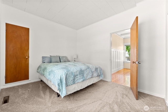 216 4th St E, Tonasket, WA 98855 - carpeted bedroom featuring baseboards