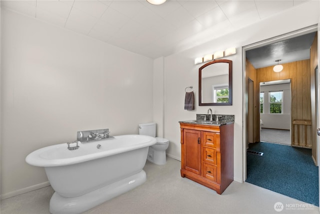 216 4th St E, Tonasket, WA 98855 - bathroom featuring a freestanding bath and vanity