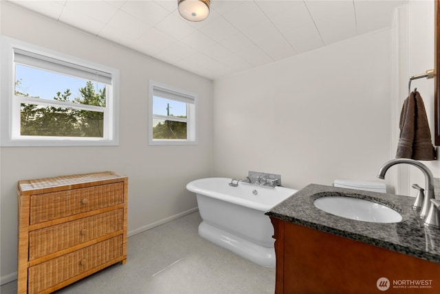 216 4th St E, Tonasket, WA 98855 - full bathroom with a freestanding tub and vanity